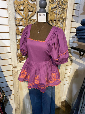 Loopy peplum