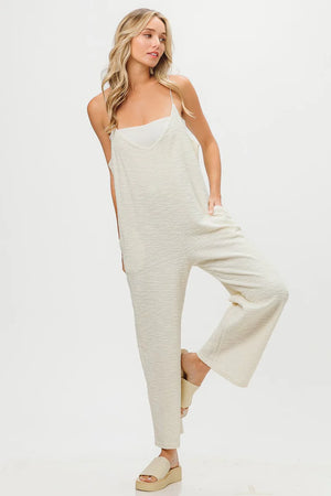 Tweed jumpsuit with pockets